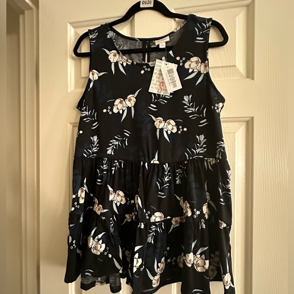 Lularoe Eliana tiered top , new with tags .
